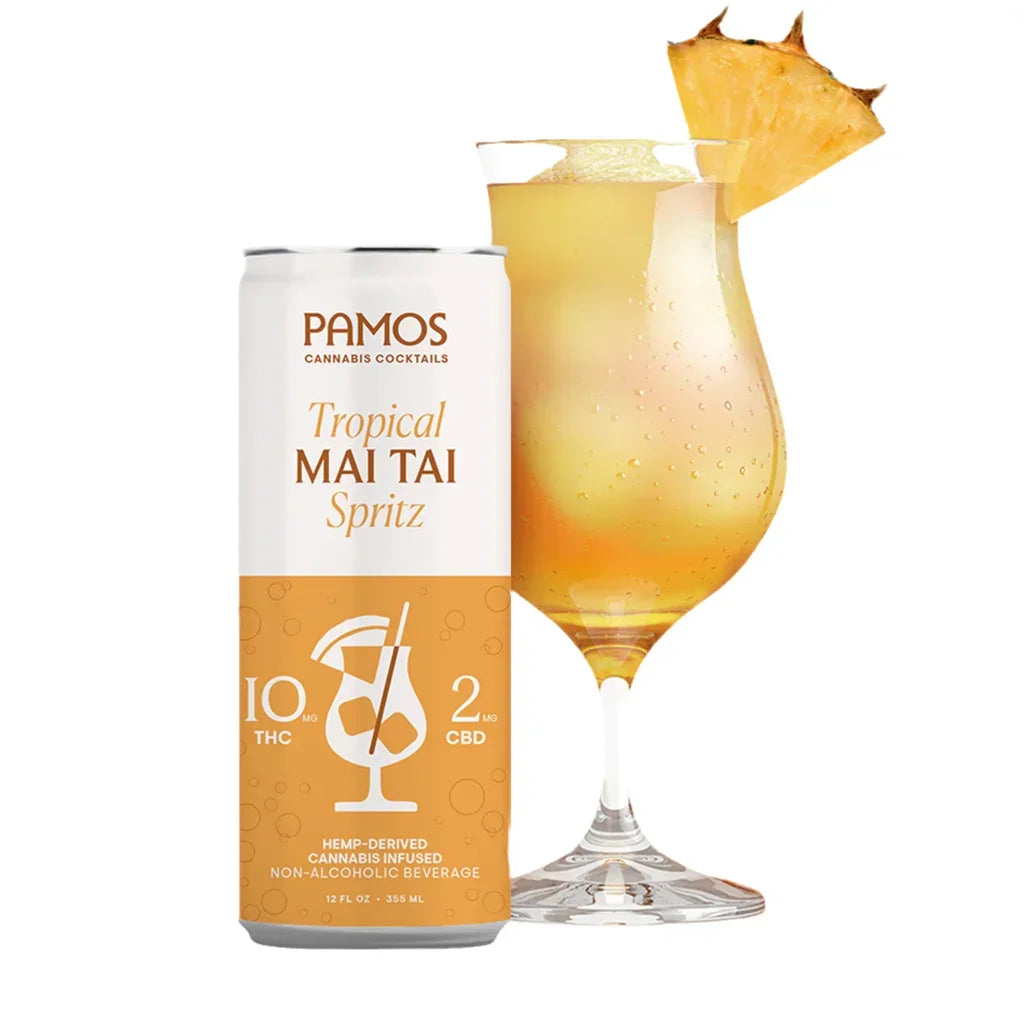 Pamos Tropical Mai Tai Spritz can, 10mg THC and 2mg CBD hemp cannabis cocktail, beside a poured glass with pineapple