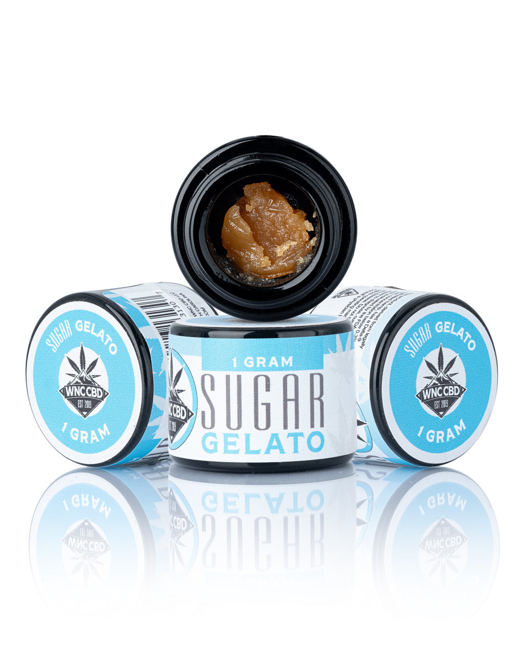 Three jars of WNC CBD Gelato THCa Sugar, 1 gram each, open top jar showing amber crystalline concentrate